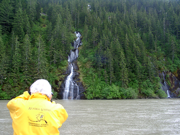Lee Duquette photographing a waterfall